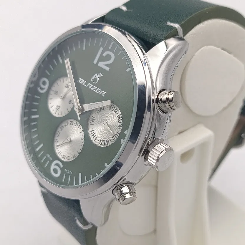 ساعت مردانه استیل صفحه سبز بلیزر موتور ژاپن بند چرم درجه یک